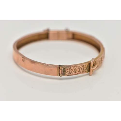 40 - A LATE VICTORIAN 9CT ROSE GOLD HINGED BANGLE, belt and buckle design with ivy leaf detail, fitted wi... 