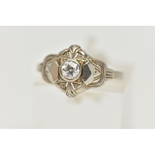 54 - A SINGLE STONE DIAMOND RING, designed as a central old cut diamond within a pierced geometric style ... 