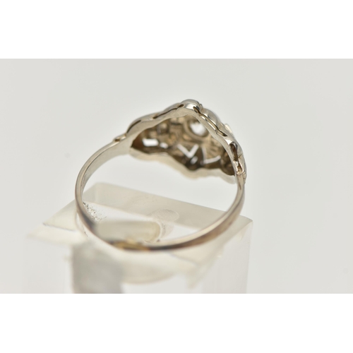 54 - A SINGLE STONE DIAMOND RING, designed as a central old cut diamond within a pierced geometric style ... 