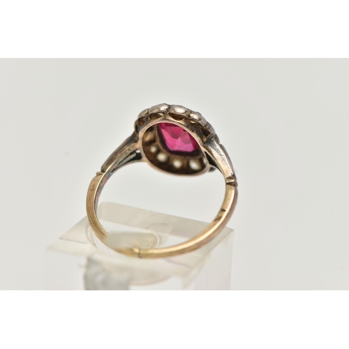 55 - AN EARLY 20TH CENTURY GEM SET RING, designed as a central rectangular ruby within an old cut diamond... 