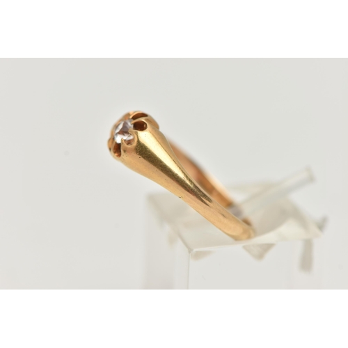 58 - AN EARLY 20TH CENTURY, 18CT GOLD RING, centring on a circular cut colourless stone, assessed as spin... 