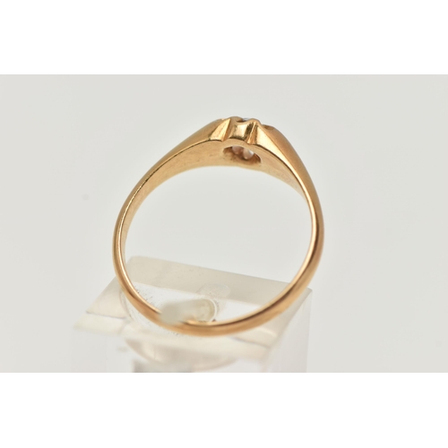 58 - AN EARLY 20TH CENTURY, 18CT GOLD RING, centring on a circular cut colourless stone, assessed as spin... 