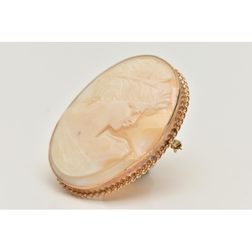 66 - A 9CT GOLD CAMEO BROOCH, of an oval outline, carved shell cameo depicting a lady in profile, milgrai... 