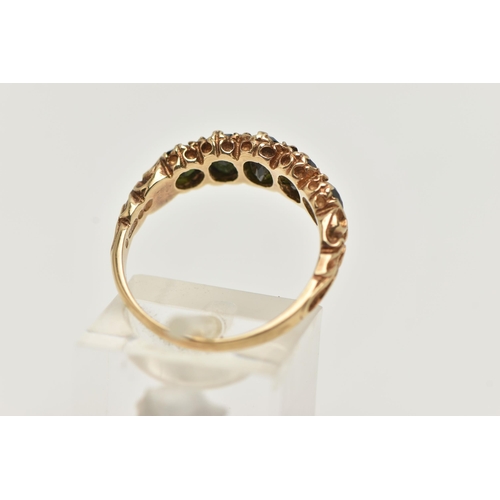 69 - A 9CT GOLD GREEN TOURMALINE RING, designed as a row of three oval cut tourmaline, and two circular c... 