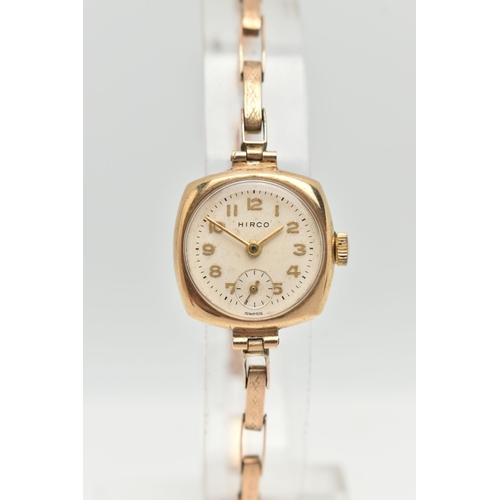 9 - A 1950'S 9CT GOLD HIRCO WRISTWATCH, the circular white/cream dial with gold coloured Arabic numerals... 