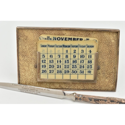 122 - A GEORGE V SILVER MOUNTED SHAGREEN PERPETUAL DESK CALENDAR OF RECTANGULAR FORM, with seven double si... 