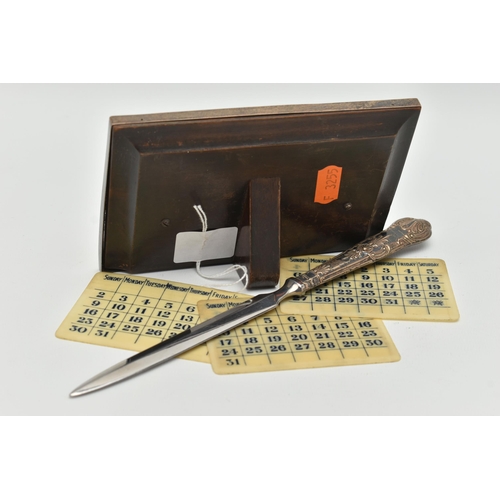 122 - A GEORGE V SILVER MOUNTED SHAGREEN PERPETUAL DESK CALENDAR OF RECTANGULAR FORM, with seven double si... 