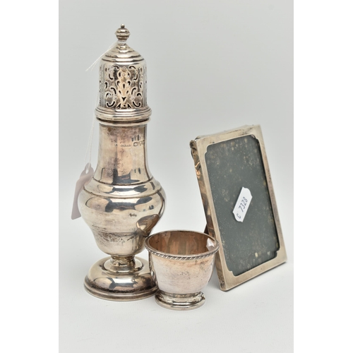 124 - THREE PIECES OF 20TH CENTURY SILVER, comprising a George VI sugar caster of baluster form, foliate p... 