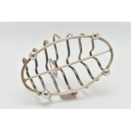 130 - A SILVER TOAST RACK, hallmarked 'G & J Bushell & Co' Birmingham 1904, approximate gross weight 4.88 ... 