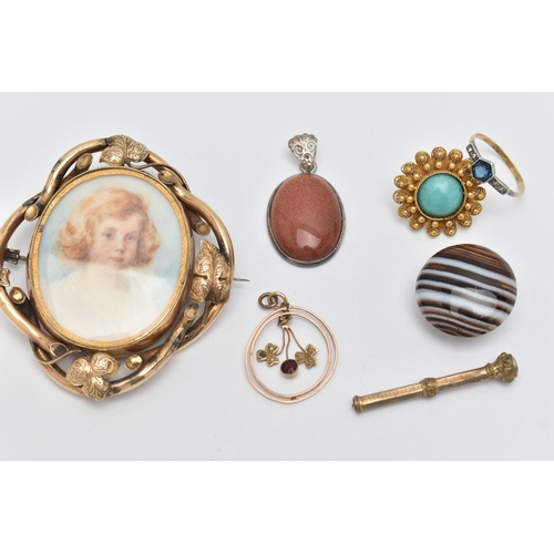 81 - A SMALL ASSORTMENT OF ITEMS, to include a yellow metal open work lavalier pendant, set with garnet a... 