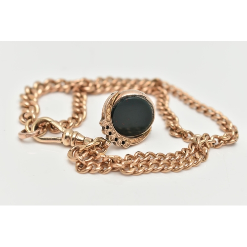 98 - AN EARLY 20TH CENTURY 9CT YELLOW GOLD ALBERT CHAIN AND HARD STONE SWIVEL FOB, the graduating solid c... 