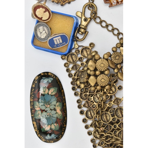 142 - A SMALL BOX OF ITEMS, to include a base metal belt, a shell cameo brooch, a 'Medana' fob watch with ... 