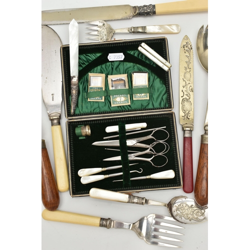 150 - A CASED SEWING KIT AND CUTLERY, the black case with green suede interior, together with button hook,... 