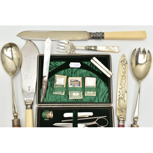 150 - A CASED SEWING KIT AND CUTLERY, the black case with green suede interior, together with button hook,... 