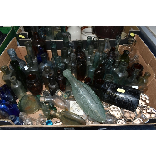 351 - TWO BOXES OF EARLY 20TH CENTURY COLOURED GLASS BOTTLES AND STONEWARE JARS, to include a brown salt g... 