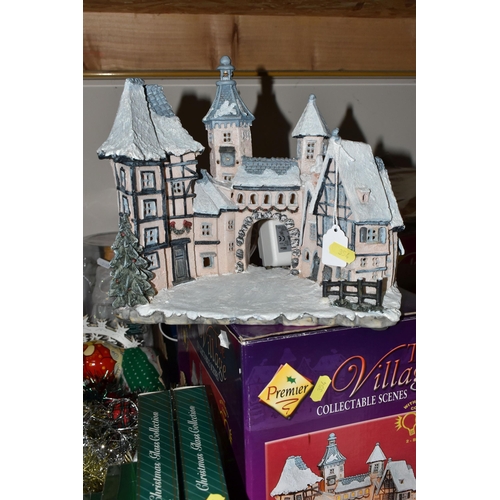 354 - TWO BOXES OF CHRISTMAS DECORATIONS, to include a boxed illuminated 'Village Carriage' scene, boxed b... 