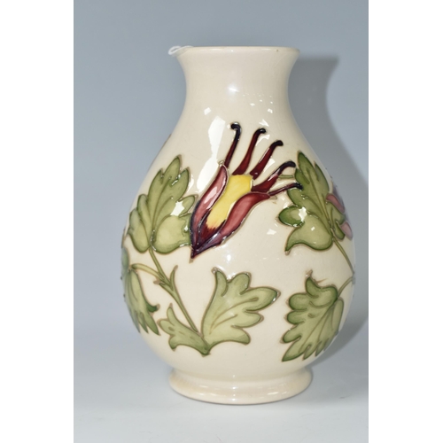 384 - A MOORCROFT POTTERY 'COLUMBINE' VASE, the baluster vase decorated with red and yellow columbine flow... 