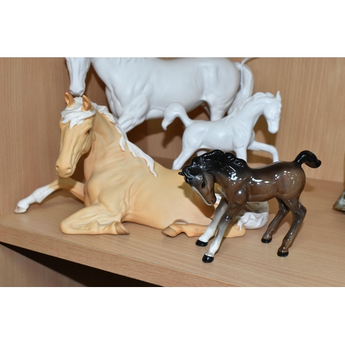 398 - FOUR BESWICK HORSES, comprising Spirit of Youth model no 2703 in white matt finish, palomino matt Sp... 