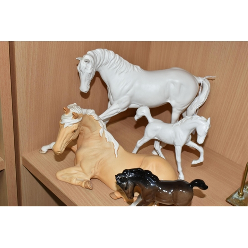 398 - FOUR BESWICK HORSES, comprising Spirit of Youth model no 2703 in white matt finish, palomino matt Sp... 