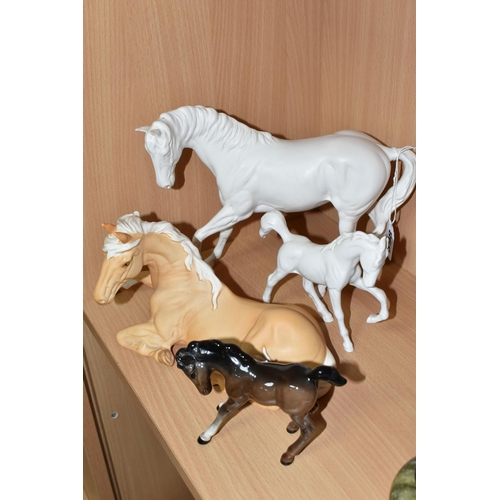 398 - FOUR BESWICK HORSES, comprising Spirit of Youth model no 2703 in white matt finish, palomino matt Sp... 