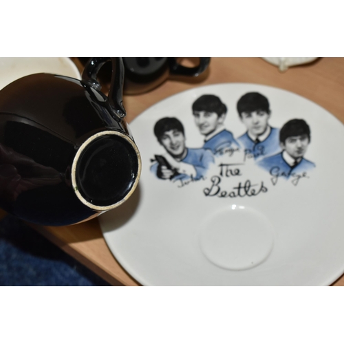 402 - FOUR WASHINGTON POTTERY 'THE BEATLES' BISCUIT PLATE SETS, comprising four biscuit plates, each print... 