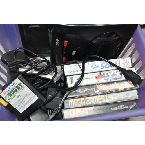 440 - TWO BOXES CONTAINING A SONY PLAYSTATION, two controllers and assorted games, two Sega/Mega Drive mac... 