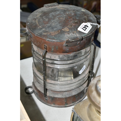 447 - A GROUP OF LAMPS AND LANTERNS, to include a carriage lamp, a nautical lantern, a railway lantern mar... 