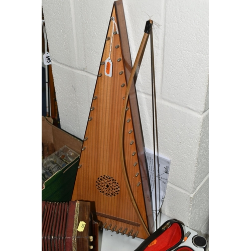 461 - A GROUP OF MUSICAL INSTRUMENTS, comprising an 'Aiden Edwards' Celtic Psaltery harp and bow, paper ma... 