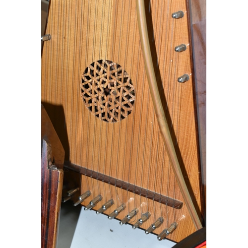 461 - A GROUP OF MUSICAL INSTRUMENTS, comprising an 'Aiden Edwards' Celtic Psaltery harp and bow, paper ma... 