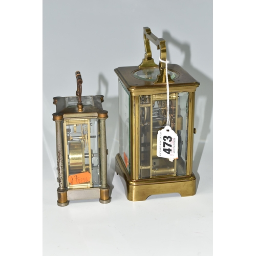 473 - TWO EARLY 20TH CENTURY CARRIAGE CLOCKS, the larger with brass case, white enamel dial with Roman num... 