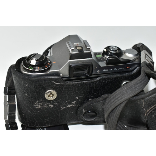 498 - A PENTAX ME 35MM CAMERA, fitted with a Pentax f2.8 40mm lens, cased (1) (Condition Report: generally... 