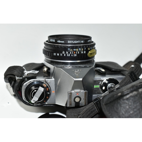 498 - A PENTAX ME 35MM CAMERA, fitted with a Pentax f2.8 40mm lens, cased (1) (Condition Report: generally... 