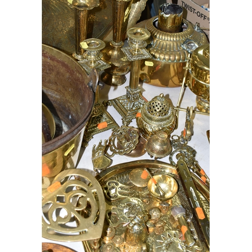 506 - A LARGE QUANTITY OF BRASSWARE, comprising a large circular table top/drinks tray, decorated with a M... 