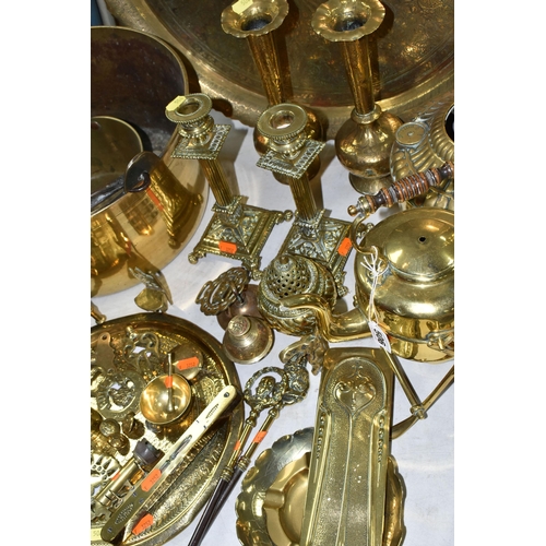 506 - A LARGE QUANTITY OF BRASSWARE, comprising a large circular table top/drinks tray, decorated with a M... 