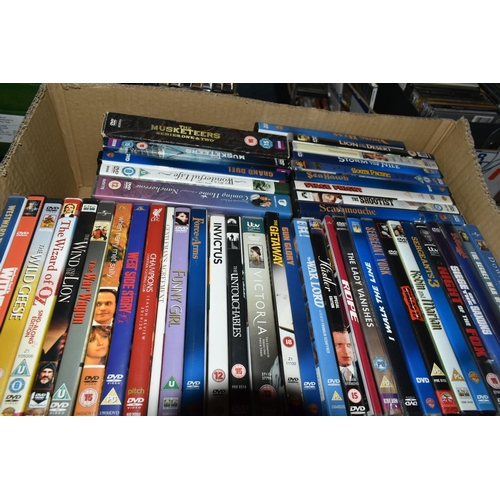 518 - SIX BOXES OF DVDS containing over 310 miscellaneous Film and TV titles including box sets