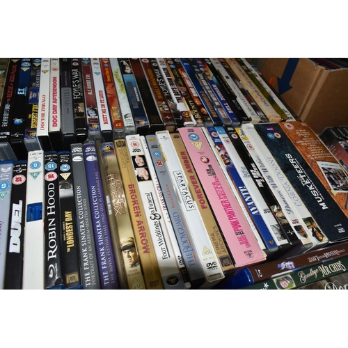 518 - SIX BOXES OF DVDS containing over 310 miscellaneous Film and TV titles including box sets