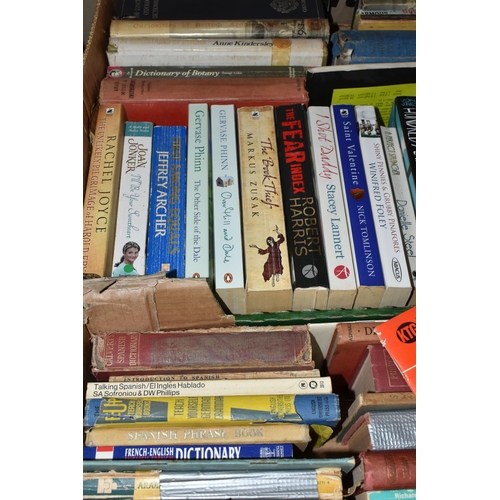 557 - THREE BOXES OF BOOKS containing over 130 miscellaneous titles in hardback and paperback formats, sub... 