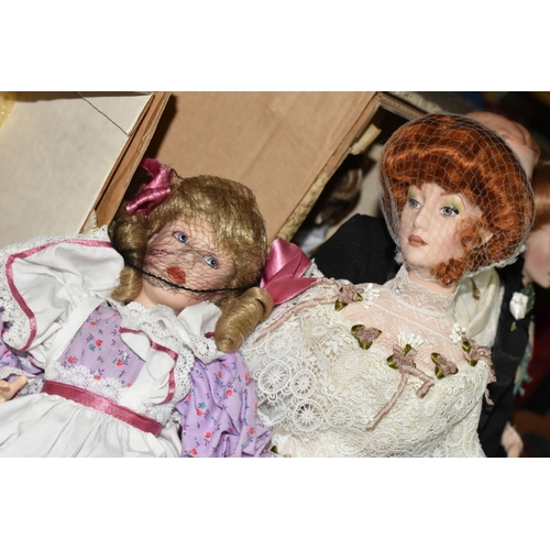 558 - ONE BOX OF COLLECTABLE PORCELAIN DOLLS, Franklin Heirloom dolls with boxes and certificates, six dol... 