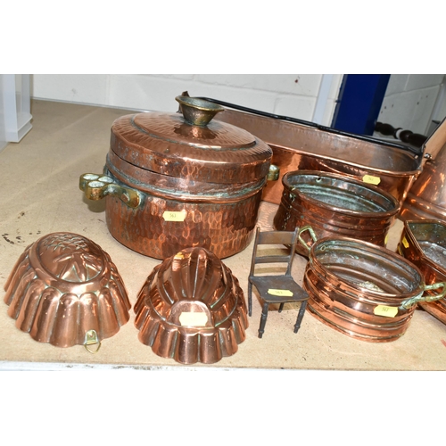 563 - A QUANTITY OF 19TH / 20TH CENTURY COPPER WARES, to include jelly moulds, warming pan, fish kettle, p... 