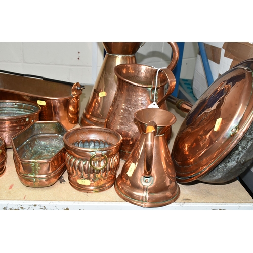 563 - A QUANTITY OF 19TH / 20TH CENTURY COPPER WARES, to include jelly moulds, warming pan, fish kettle, p... 