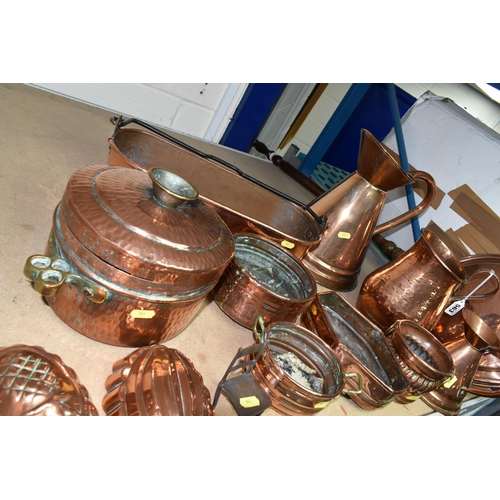 563 - A QUANTITY OF 19TH / 20TH CENTURY COPPER WARES, to include jelly moulds, warming pan, fish kettle, p... 