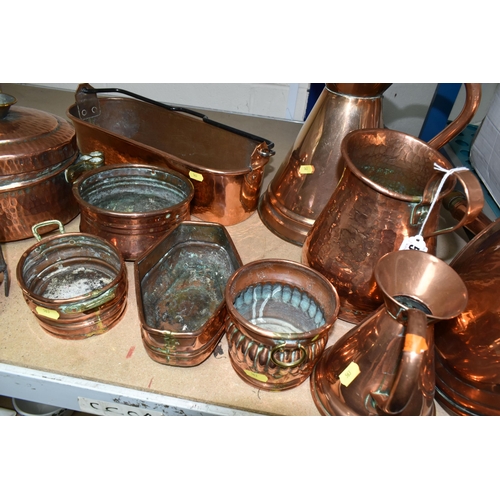 563 - A QUANTITY OF 19TH / 20TH CENTURY COPPER WARES, to include jelly moulds, warming pan, fish kettle, p... 