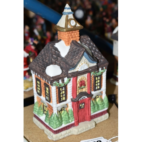 573 - TWO LEMAX CHRISTMAS VILLAGE TRAIN SETS AND WINTER BUILDINGS ETC, to include three churches, three in... 