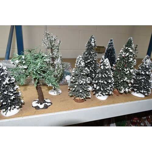 576 - A COLLECTION OF CHRISTMAS VILLAGE FIGURES, TREES AND OTHER ITEMS, to include over one hundred figure... 