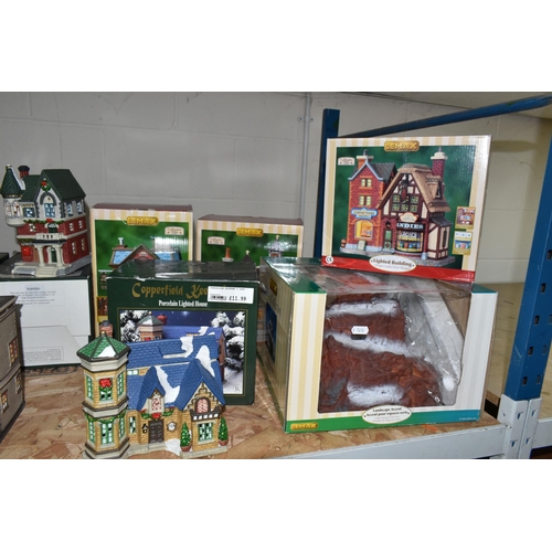 586 - A COLLECTION OF BOXED CERAMIC CHRISTMAS VILLAGE BUILDINGS, by Department 56, Lemax and Copperfield K... 