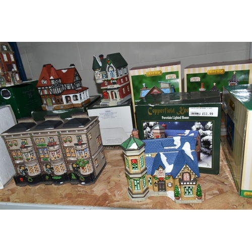 586 - A COLLECTION OF BOXED CERAMIC CHRISTMAS VILLAGE BUILDINGS, by Department 56, Lemax and Copperfield K... 