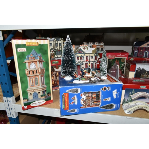 586 - A COLLECTION OF BOXED CERAMIC CHRISTMAS VILLAGE BUILDINGS, by Department 56, Lemax and Copperfield K... 