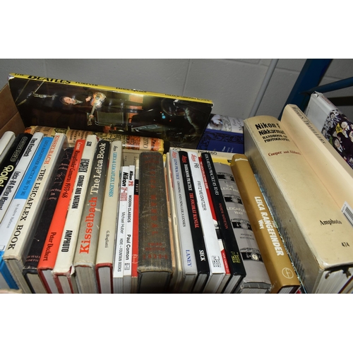 587 - TWO BOXES OF BOOKS containing over sixty miscellaneous titles in hardback and paperback formats, sub... 