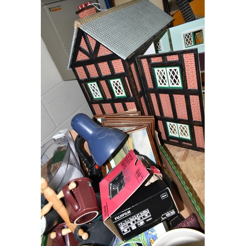 590 - A MODERN KIT BUILT WOODEN DOLLS HOUSE, front opening to reveal four rooms over two floors, construct... 