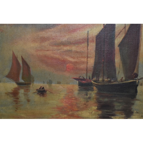 599 - AN EARLY 20TH CENTURY MARITIME SCENE, depicting working boats and a tender at sunset, no visible sig... 